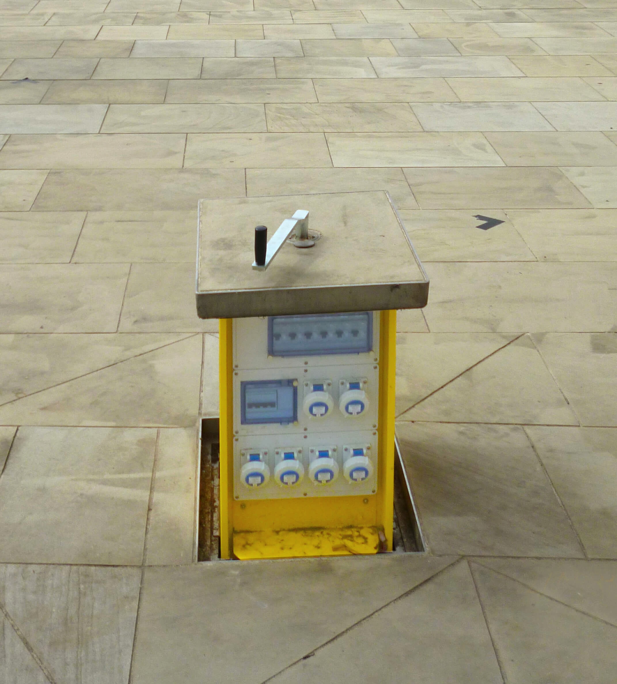 Pop up unit on paved flooring